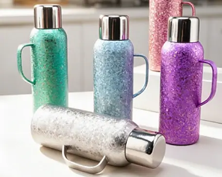 Titanium drinkware customization showcasing tumblers and vacuum insulated bottles